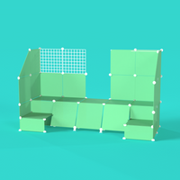 Front-right angle of BOOF Stand in Mint Green with display-ready setup for conventions