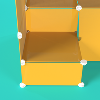 Close-up of tiered shelf on BOOF Stand in Mustard Yellow, ideal for product display and browsing