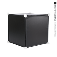 Frosted fully black square cube panels assembled in front of a white background - perfect for creative and modular artist alley & convention booth setups